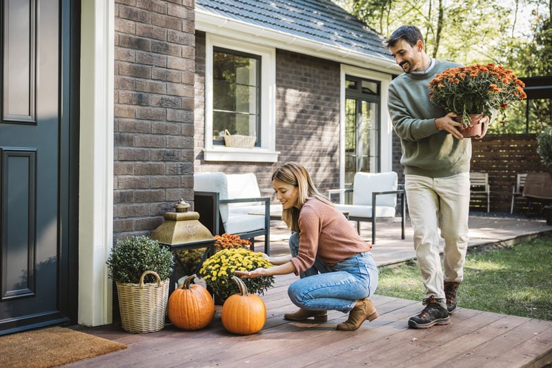 September monthly newsletter. Couple preparing their home for fall.